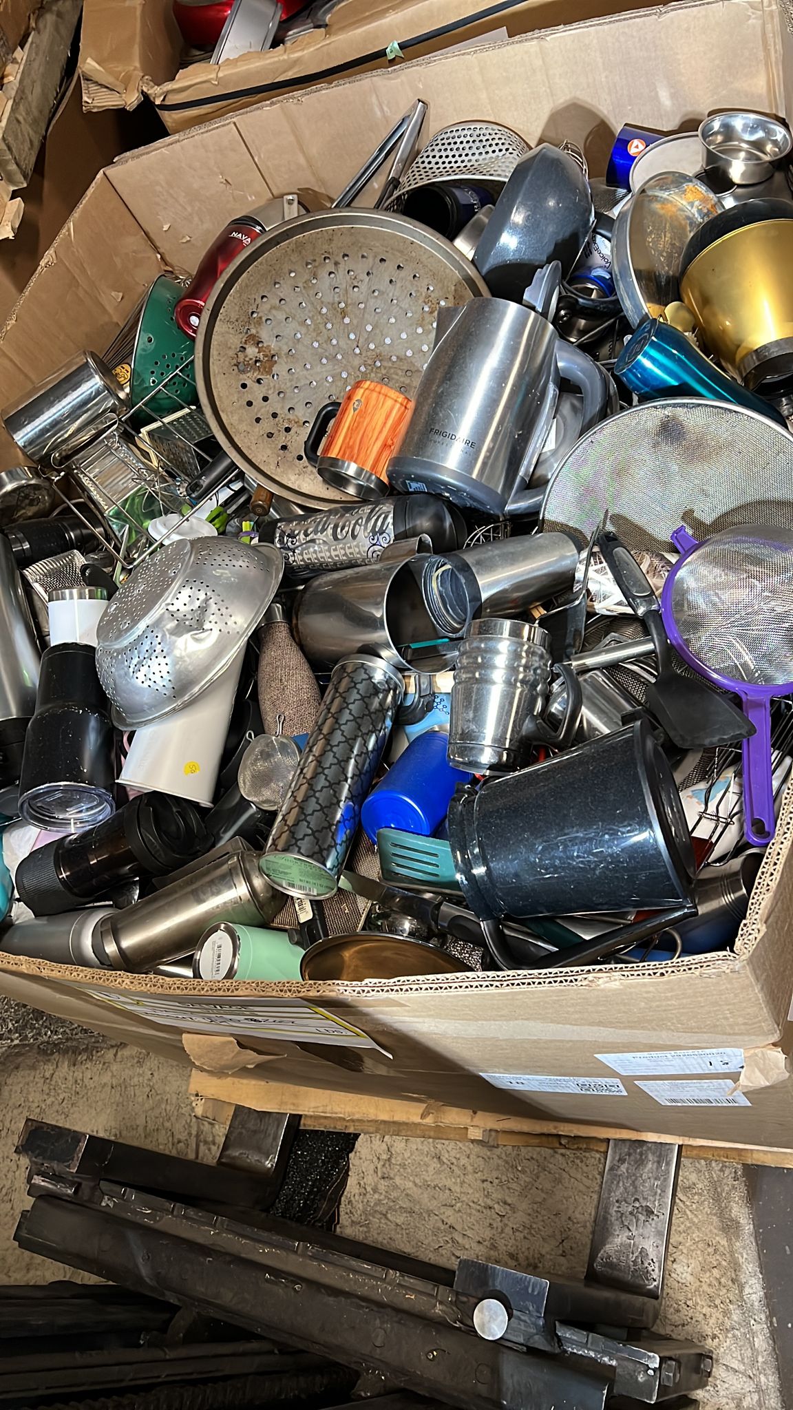 Box of used pots and pans